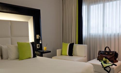 Habitación Superior - Cama grande del hotel Novotel Buenos Aires. Foto 2