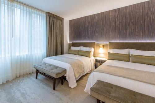 Habitación Deluxe con 2 camas dobles del hotel Marriott Vacation Club®, New York City. Foto 1