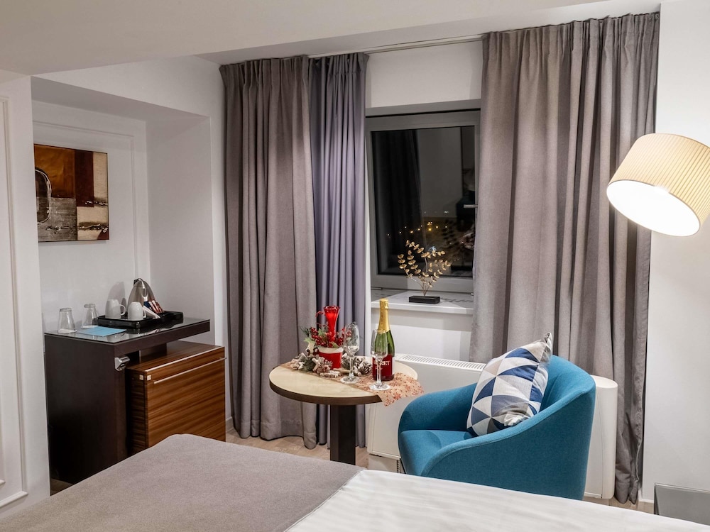 Habitación Estándar con una Cama Queen del hotel Bucharest Unirii Square - Handritten Collection. Foto 6