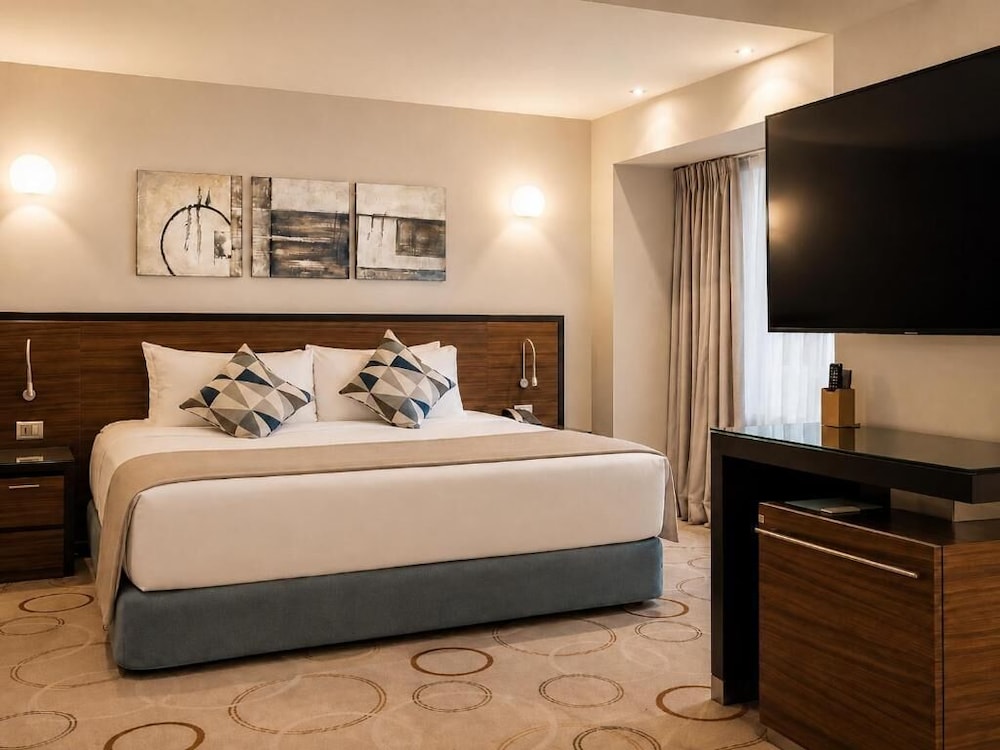 Suite Ejecutiva con 1 Cama King del hotel Bucharest Unirii Square - Handritten Collection. Foto 4