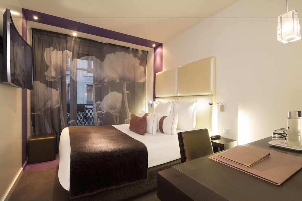 Habitación clásica (pequeña) del hotel Grand Hotel Saint Michel. Foto 2