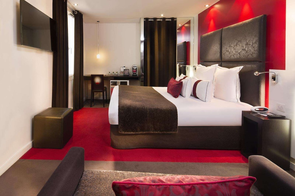Habitación triple del hotel Grand Hotel Saint Michel. Foto 2