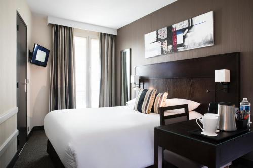 Habitación Doble del hotel Albert 1er Paris. Foto 8