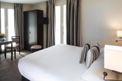 Habitación Doble del hotel Albert 1er Paris. Foto 10