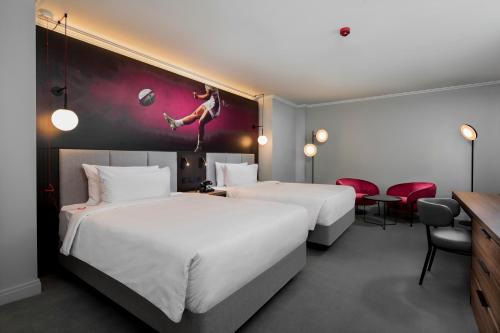 Habitación Familiar del hotel Radisson RED London Twickenham. Foto 5