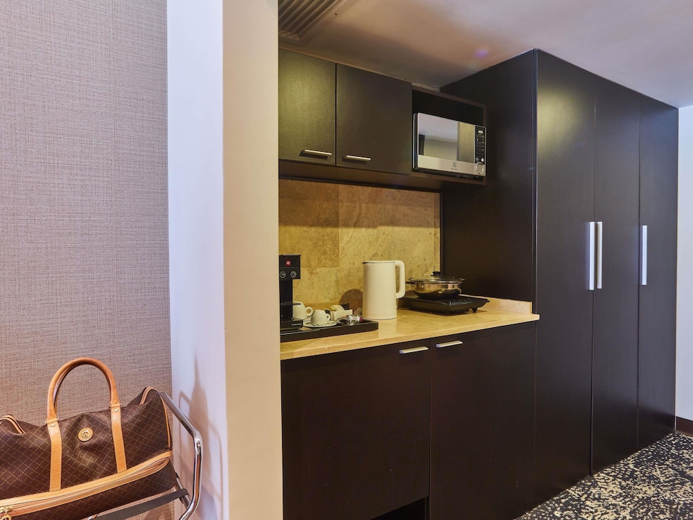 Habitación de categoría superior con una cama King Size del hotel Manto Lima – Mgallery. Foto 2