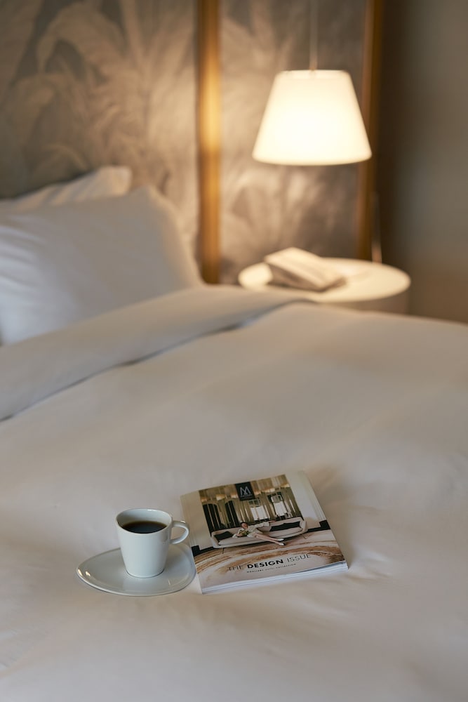 Habitación Deluxe con una cama King size del hotel Manto Lima – Mgallery. Foto 10