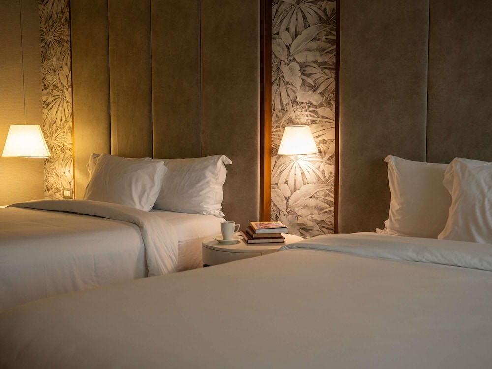Habitación Deluxe con dos camas dobles del hotel Manto Lima – Mgallery