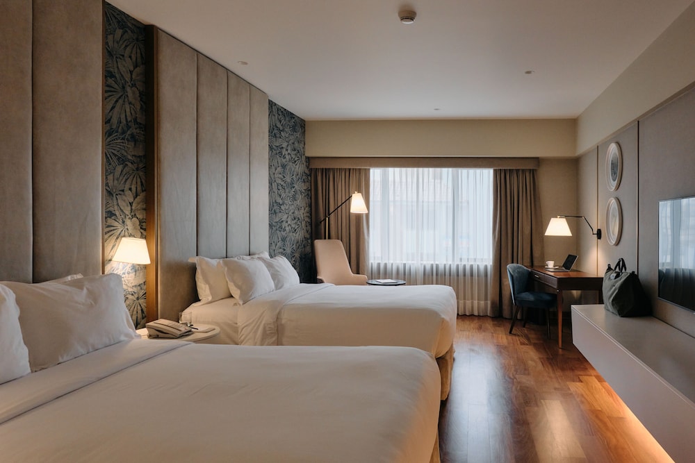 Habitación Deluxe con dos camas dobles del hotel Manto Lima – Mgallery. Foto 2