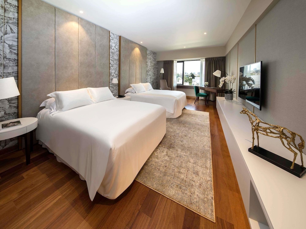 Habitación Deluxe con dos camas dobles del hotel Manto Lima – Mgallery. Foto 10