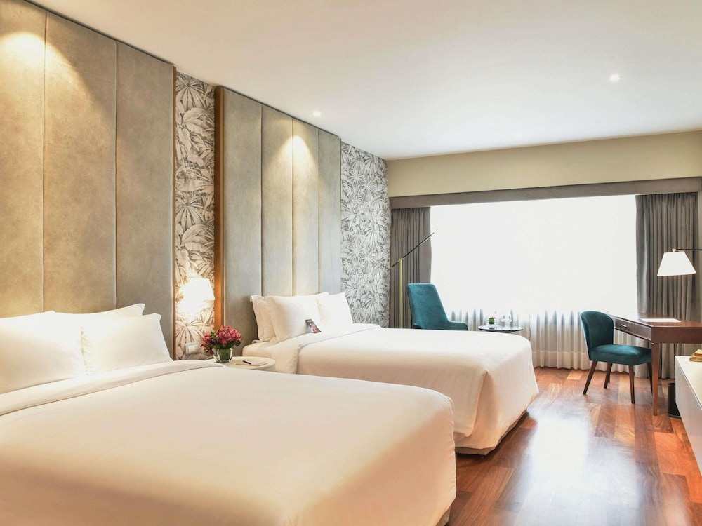 Habitación Deluxe con dos camas dobles del hotel Manto Lima – Mgallery. Foto 13