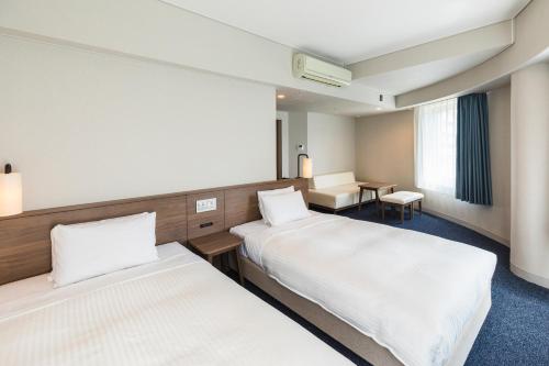 Habitación Doble Deluxe - 2 camas - fumadores del hotel Sotetsu Fresa Inn Tokyo Toyocho