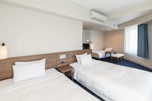 Habitación Triple Deluxe para no fumadores del hotel Sotetsu Fresa Inn Tokyo Toyocho