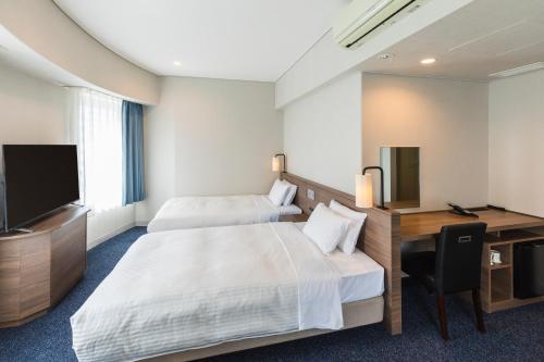 Habitación Doble Deluxe para no fumadores - 2 camas individuales del hotel Sotetsu Fresa Inn Tokyo Toyocho. Foto 1