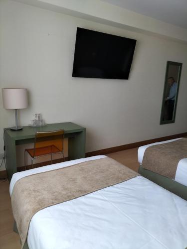 Habitación Doble dos camas del hotel Naval Sestao. Foto 1