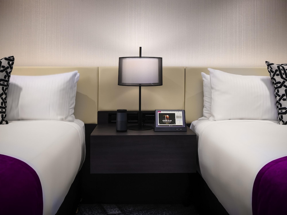 Habitación superior, 2 camas de matrimonio del hotel Pullman Melbourne City Centre. Foto 3