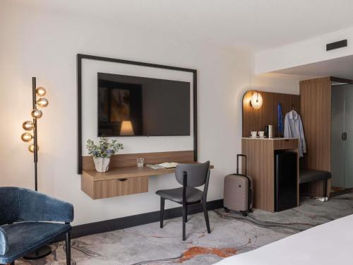 Habitación Deluxe junto a la Piscina con Terraza del hotel Mercure Brisbane Spring Hill. Foto 5
