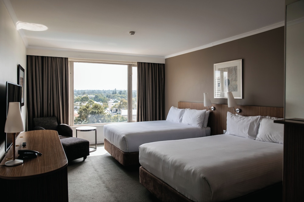 Habitación Clásica Twin del hotel Mercure Sydney Parramatta. Foto 1
