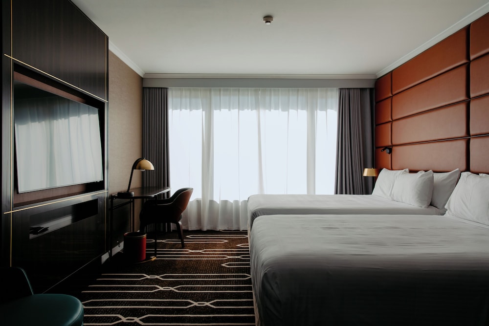 Habitación Superior Twin del hotel Mercure Sydney Parramatta. Foto 1