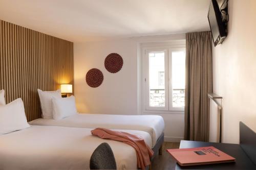 Habitación Doble - 2 camas del hotel Korner Opéra. Foto 4