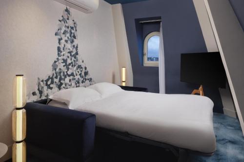 Duplex Suite with Eiffel Tower view del hotel Crowne Plaza Paris Republique, by Ihg