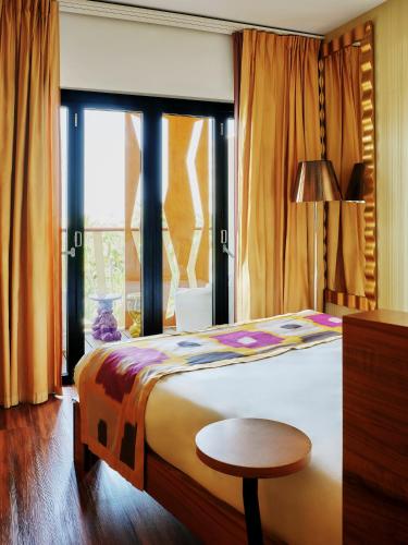 Habitación doble Vista Piscina Vista Jardin 1 Cama king del hotel Bohemia Suites and Spa - Adults Only