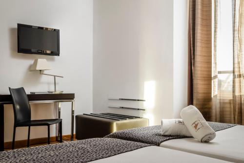 Habitación Triple del hotel Eurostars Roma Aeterna. Foto 4