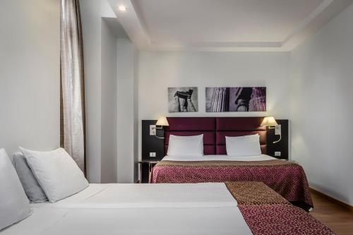 Habitación Familiar del hotel Eurostars Roma Aeterna. Foto 2