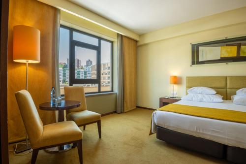 Junior suite Lujo Sofá Cama incluido 1 Cama doble del hotel Vila Galé Coimbra. Foto 16