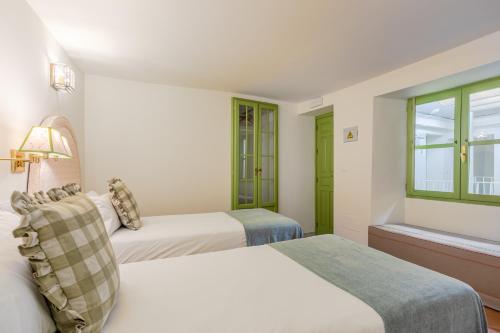 Habitación Doble - 1 o 2 camas del hotel La Abadia de Giralda. Foto 1