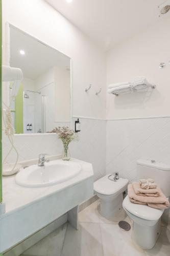 Habitación Doble - 1 o 2 camas del hotel La Abadia de Giralda. Foto 16