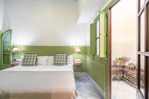 Habitación Doble - 1 o 2 camas del hotel La Abadia de Giralda. Foto 26