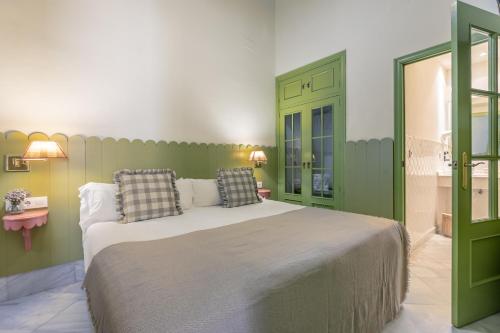 Habitación Doble Económica - 1 o 2 camas del hotel La Abadia de Giralda. Foto 4