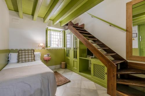 Habitación Dúplex del hotel La Abadia de Giralda. Foto 1