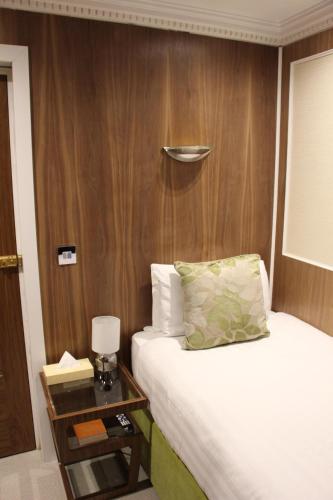 Habitación Individual del hotel Cheshire Central London. Foto 7