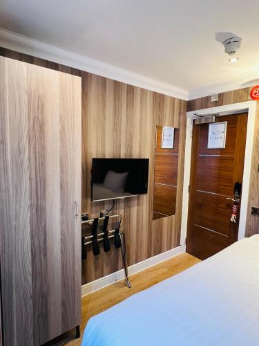 Habitación Individual del hotel Cheshire Central London. Foto 9
