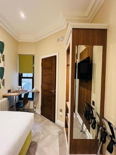 Habitación Individual del hotel Cheshire Central London. Foto 11
