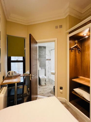 Habitación Individual del hotel Cheshire Central London. Foto 14
