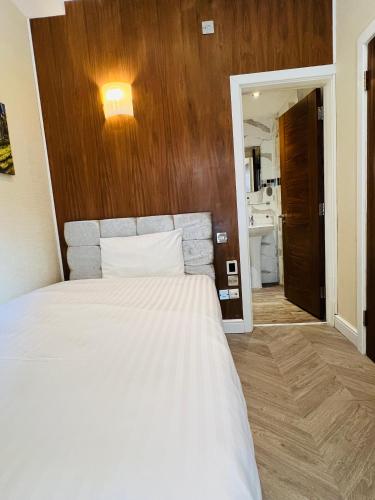 Habitación Individual del hotel Cheshire Central London. Foto 24