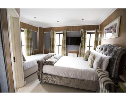 Habitación Triple del hotel Cheshire Central London. Foto 5