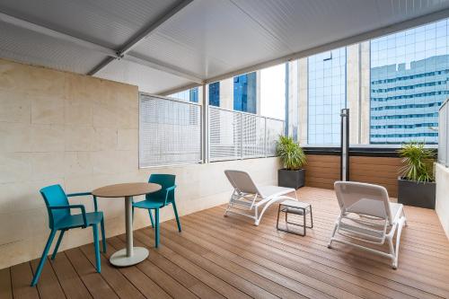 Habitación Doble con terraza del hotel Occidental Murcia Agalia. Foto 9
