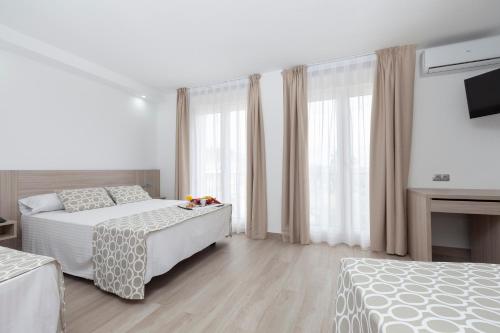 Habitación Cuádruple del hotel Olympia Ronda Ii. Foto 3