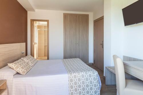 Habitación Doble con Terraza del hotel Olympia Ronda Ii. Foto 3