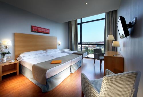 Habitación Triple del hotel Exe Sevilla Palmera