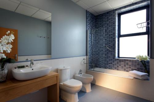 Habitación cuádruple del hotel Exe Sevilla Palmera. Foto 4