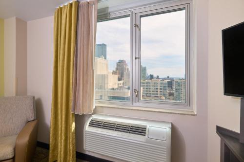 Estudio con vistas a la ciudad - 1 cama grande del hotel Candlewood Suites Times Square. Foto 4