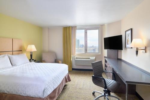 Suite Estudio con cama grande - Planta superior del hotel Candlewood Suites Times Square. Foto 1