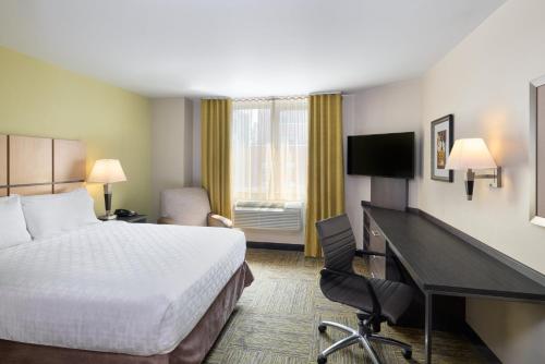 Suite Estudio con cama grande - Planta superior del hotel Candlewood Suites Times Square. Foto 7