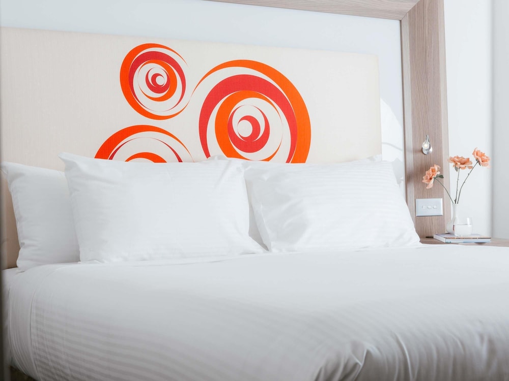 Habitación Estándar 2 Camas Dobles del hotel Novotel Melbourne Glen Waverley. Foto 1