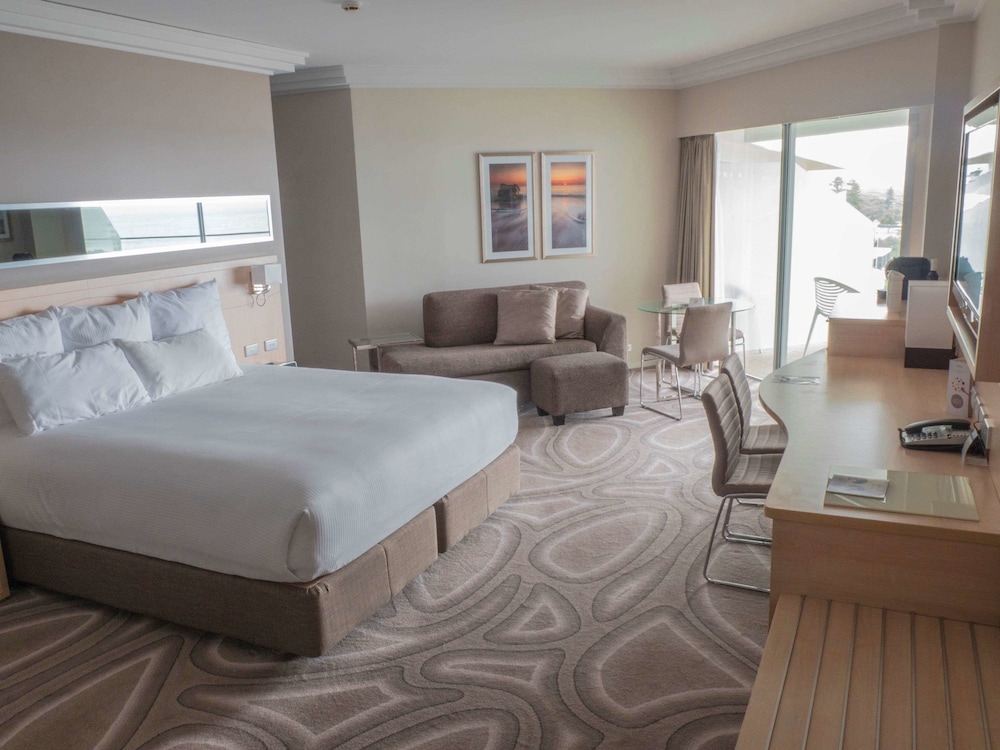 Suite Estudio, 1 Cama King y Sofá Cama del hotel Novotel Wollongong Northbeach. Foto 1